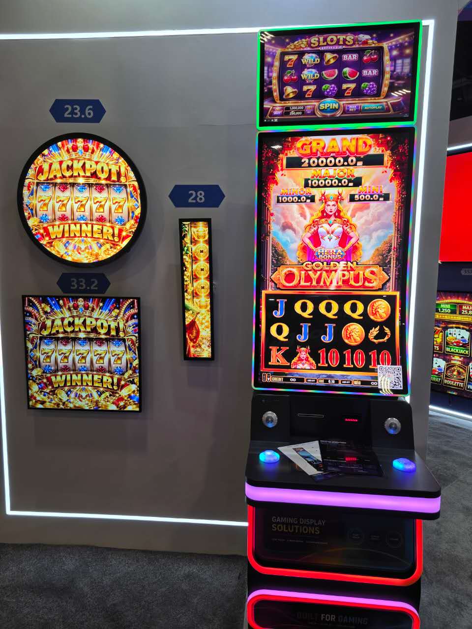 On-site gaming terminal with illuminated displays and a multi-format display showcase